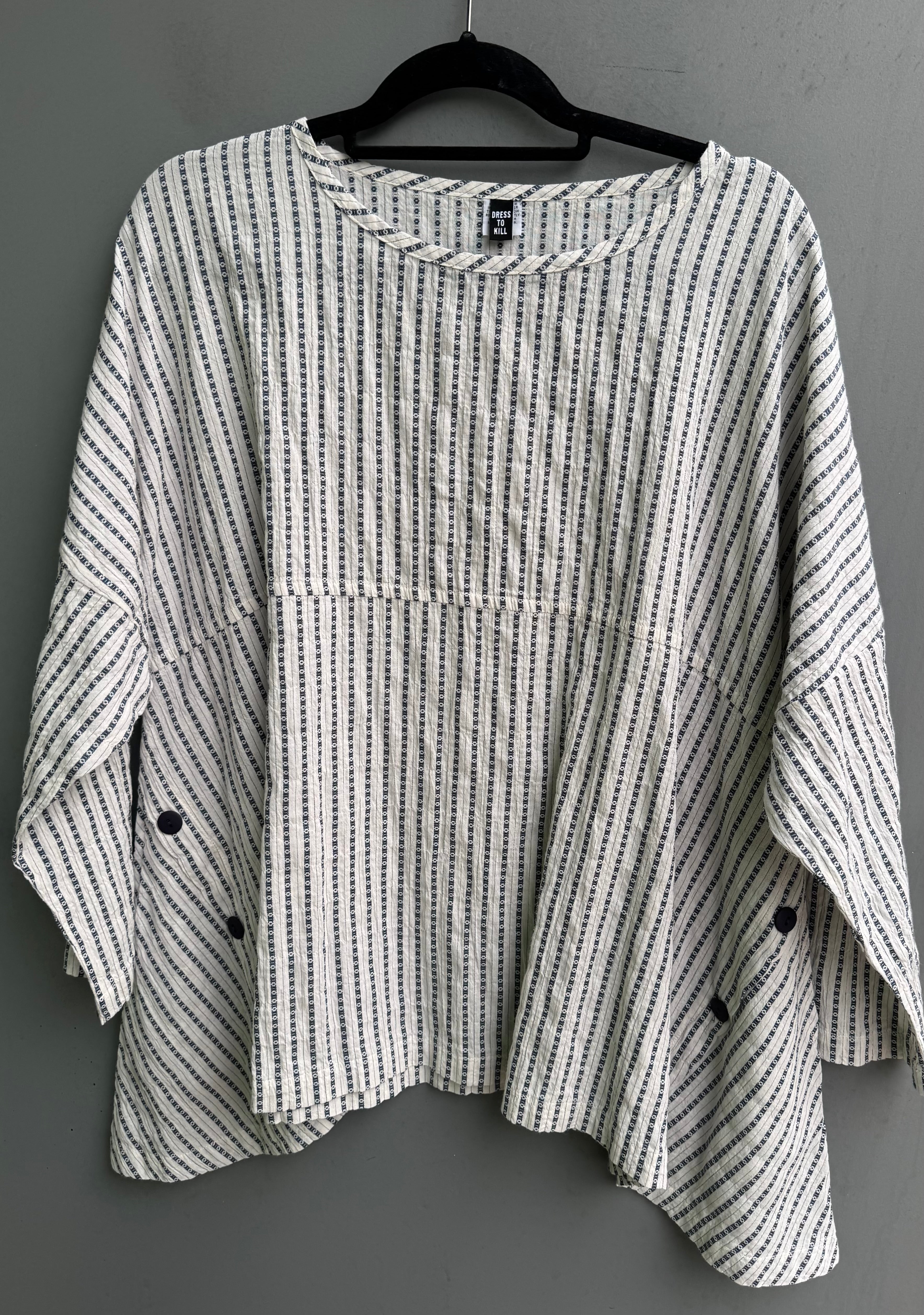 Side Button Pull – Layered Boutique